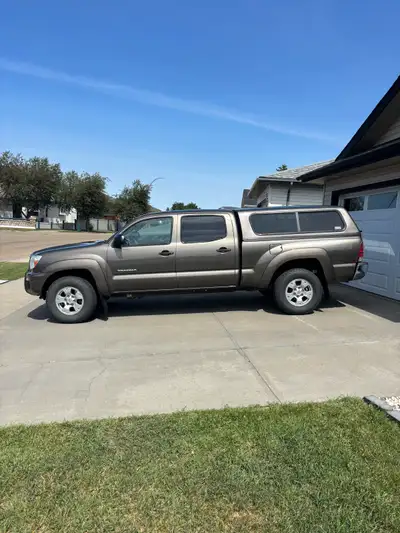 Will lower price to $23500 without canopy. Really clean for its age, has 215000 km comes with matchi...