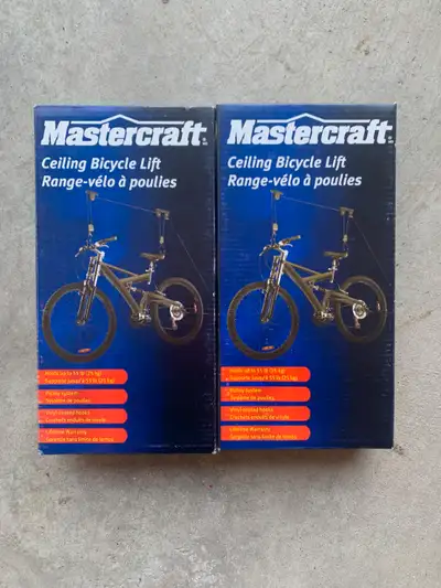 NEW in box. $10 each. Two Mastercraft Ceiling Bicycle Lifts.