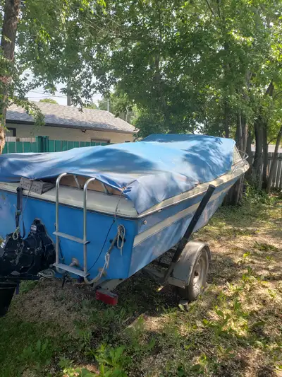 18 ft deep v hull. Motor was rebuilt. years ago but very few hours Easy load trailer included. Lots...