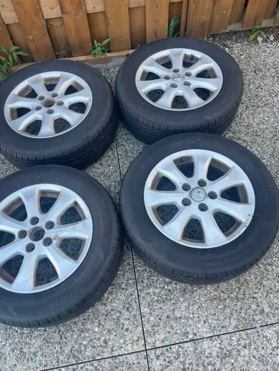 4 WINDA summer Tires 215/60R16 on Toyota rims. Tires are almost brand new. Came off from 2008 Toyota...