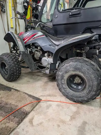 Great starter quad. 3 gears, no clutch. Will need a new tires soon.
