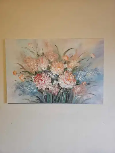 This oil painting adds a touch of elegance to your home with this charming floral painting! Looks to...