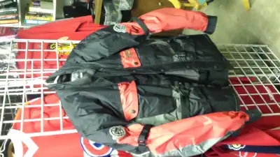 This is a very high end bike jacket. Removable liner, vents, tie straps, heavy nylon fabric for wet...