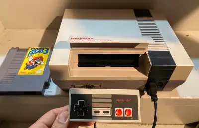 Nintendo NES System, Super Mario Game and Controller, View more