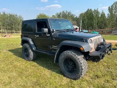 2012 Jeep JK Sport 164,xxx km 2.5” AEV lift with bolstering shocks 35x12.5 R 17 Fierce Attitude tire...