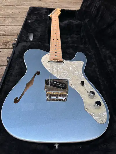 For sale is my Fender American Elite Telecaster Thinline in Mystic Blue Ice. This semi-hollow instru...