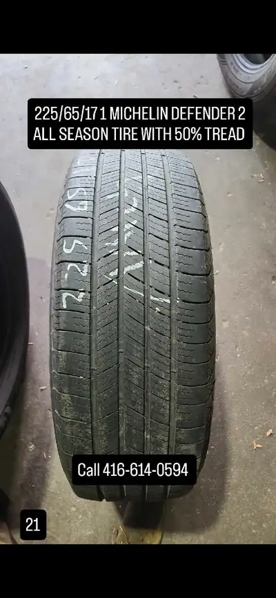 Offering a Michelin Defender 2 all-season tire, size 225/65/17, in used condition with approximately...
