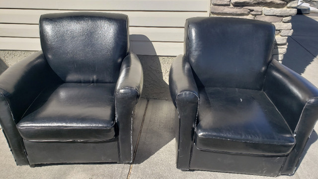 Black leather chairs in Chairs & Recliners in Calgary