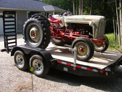 Excellent (like new) condition. Spare tire (new) and 6 stake pocket D rings available. $5000.00 FIRM...