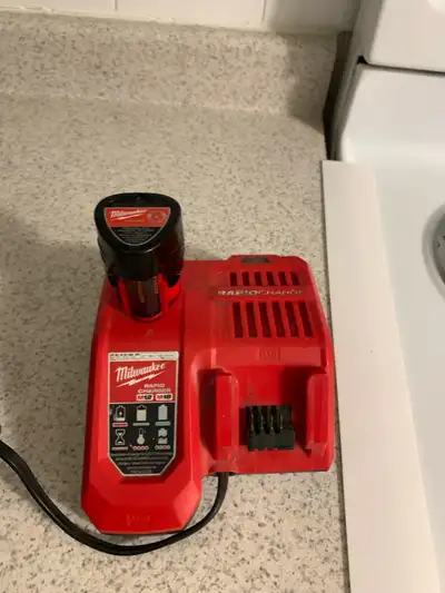 MILWAUKEE 12V & 18V BATTERY CHARGER- comes with 1x12V battery, View more
