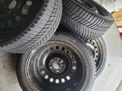 Selling a set of 17” rims with winter tires off a Subaru WRX. Still got a good amount of thread left...