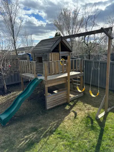 This is a custom wood play house or play structure. Can come down in a few pieces. Can be lifted ove...