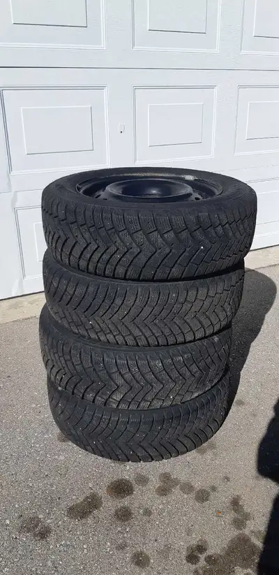 4 winter tires with rims Tires: Polar Trax WPS 88T M+S Size: 185/65R 15 They're in excellent conditi...