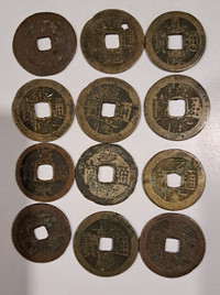 12 Old Chinese Coins with holes in them