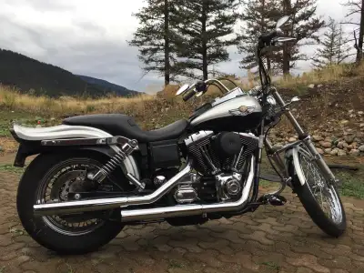 100th anniversary. Bike is in miles not km, 14,000 miles. Runs great, comes with stock and custom pa...