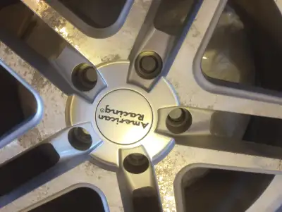 4 Michelin M & S winter tires on America's Racing rims. Size 215/55R 17 5 stud approx 3.5" ctr to ct...