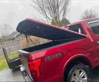 Not even small scratches, 6.5 bed cover. Ruby red color. Come with key...