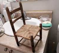 Vintage hand made wood carved mini chair