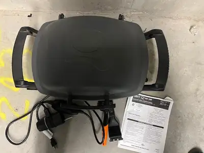 Gently used and well-maintained, compact, powerful 1,560-watt electric grill, porcelain-enameled cas...