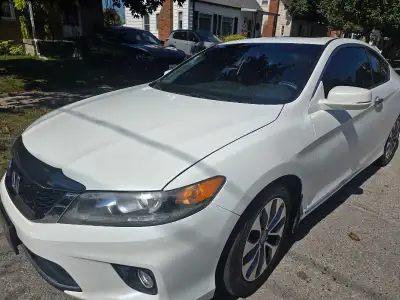Great honda lots done to this car very good on gas 2.4l with two sets of rims snow and summers loade...