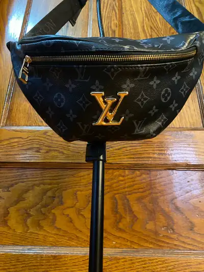 Brand New, never used. Elevate your style with this eye-catching, used Louis Vuitton bum bag, perfec...