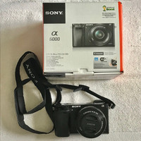 Sony Alpha 6000 Digital Camera With Extra Lens + Accessories