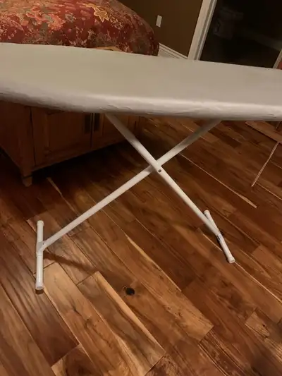 Mint condition and barely used. White aluminum material. Includes cover. Adjustable height. 13” X 52...