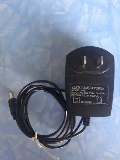 CMOS Power AC Adapter 9V DC 500mA, View more