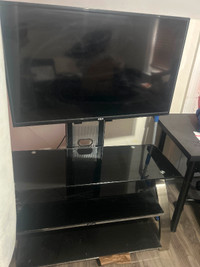 Tv and stand (accepting offers)