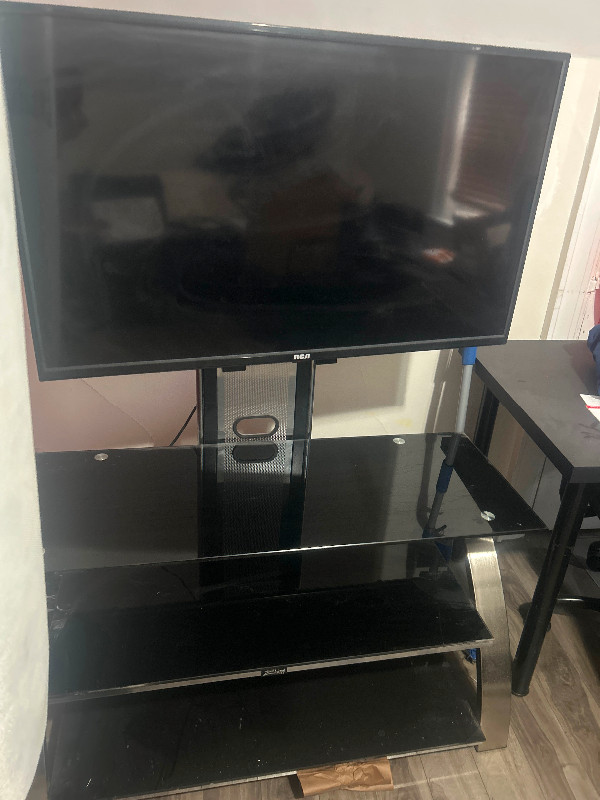 Tv and stand (accepting offers) in TV Tables & Entertainment Units in Oshawa / Durham Region