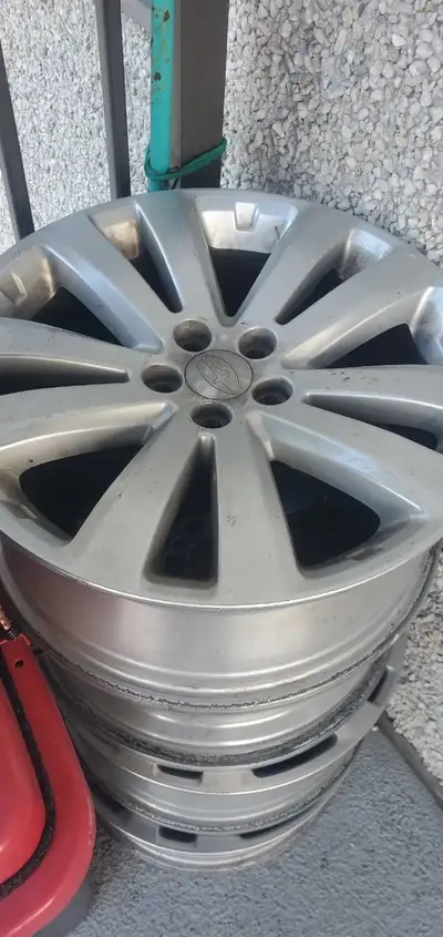 replacements used on Forester for snows Specs on inside of rims: ENKEI J2 17X7 J 48 DOT J C23 100AW2...
