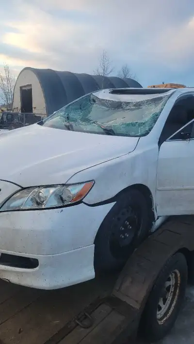Selling parts camry, vehicle was in a light roll over. Damaged panels are hood,driver door and fende...