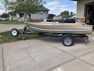12' aluminum Misty River fishing boat comes with trailer, new Minn Kota 40 lb thrust, 36" shaft elec...