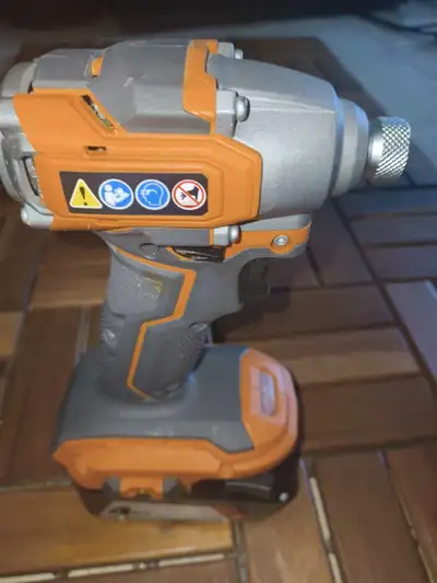 Ridgid Impact Driver & 4 ah battery, View more