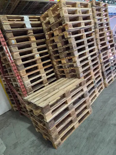 Good used pallets hundreds in stock indoors DRY wood plastic etc 48x40 wood. 31.5x47.5 euro wood pla...