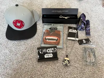 Everything is brand new! Includes Hat, lanyard with card holder, Luke Skywalker lightsaber letter op...
