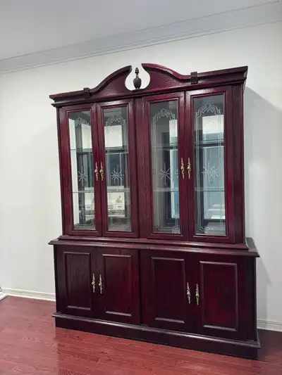 ---- China Cabinet for Free ---- Free dark wood china cabinet with glass display doors and lower sto...