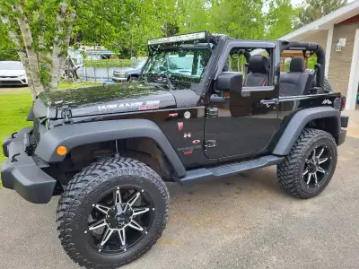 Looking to sell my 2016 Jeep Wrangler 2 Door, V6 automatic, a robust SUV with approximately 110,000...