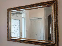 Large Gold framed mirror 42 1/2 x 30 1/2”. Like new.