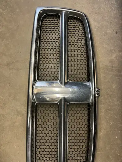 I have a 3rd gen 2003-2005 grill with emblem in nice shape. Nothing cracked or broken. 4 bushwaker f...