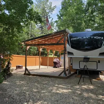 Lot 449 at the gated RV park of Hilah Ayers. This spacious leased lot is low maintenance and nicely...