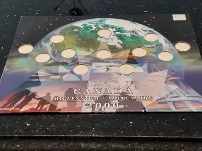 Canada 2000 millenium quarter map holder, View more