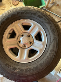 265/70R16 Goodyear Wrangler on Jeep rims barely used