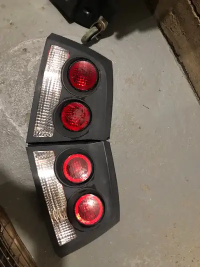 Selling a pair of used 2009-2010 Dodge Charger tail lights. These lights are in fair condition, They...