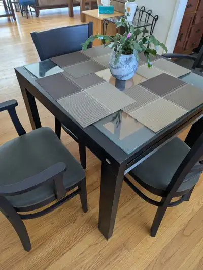 Glass Table and Four Chairs Dining Set. Lightweight table slight, View more