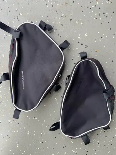 Bags that attach to side engine guards for suzuki v strom motorcycles, asking $25 for the pair, loca...