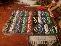 Poker chips with low values. $1, $2, $5, $10 and $20