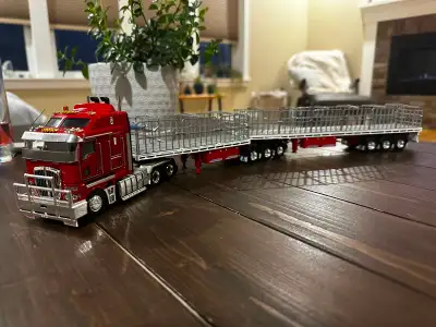 Australian K200 Cabover 2.8 with a set of B-Double flat top trailers. Apart from being a little dust...
