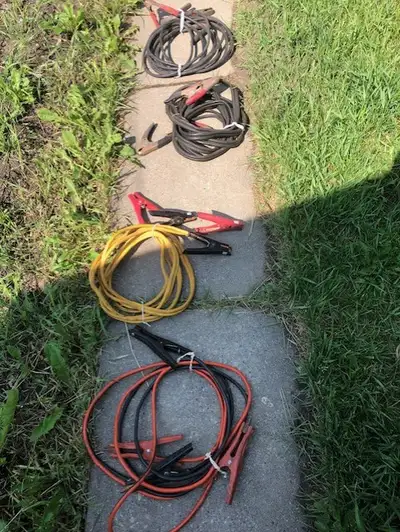 four heavy duty booster cables - like new - $ 50 each