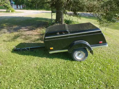 Motorcycle or small car trailer. Some bumps and bruises but in good shape. All lights work. New spar...